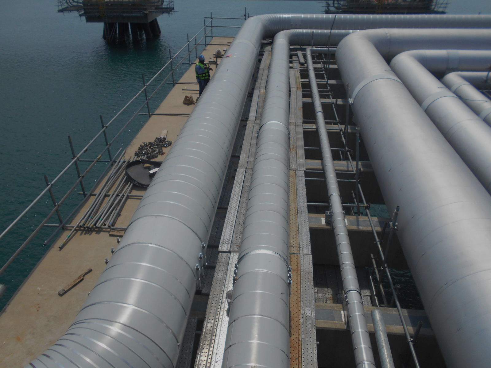LNG regasification piping · jetty and onshore